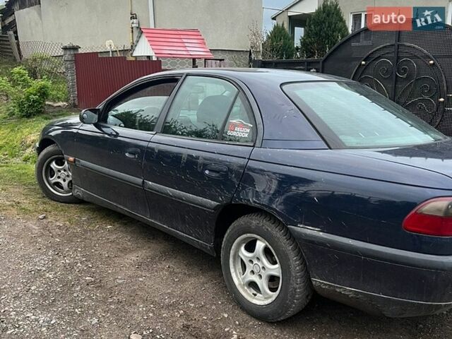 Синий Опель Омега, объемом двигателя 2 л и пробегом 340 тыс. км за 1100 $, фото 1 на Automoto.ua