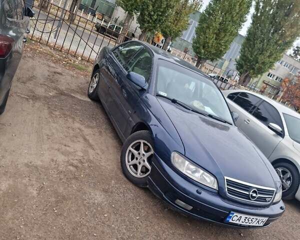 Синий Опель Омега, объемом двигателя 2.2 л и пробегом 251 тыс. км за 3500 $, фото 1 на Automoto.ua