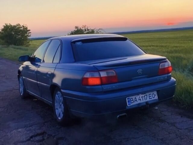 Синий Опель Омега, объемом двигателя 3 л и пробегом 345 тыс. км за 2700 $, фото 1 на Automoto.ua