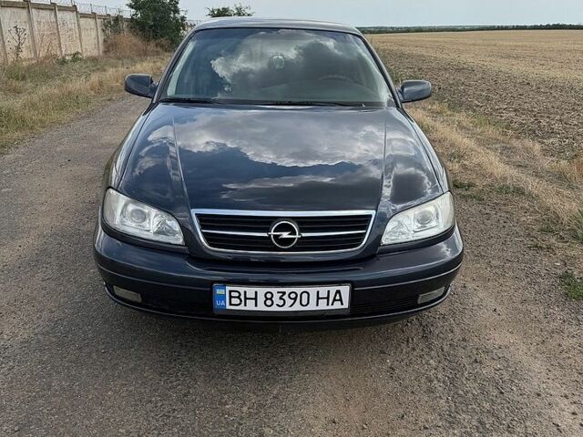 Синий Опель Омега, объемом двигателя 2 л и пробегом 240 тыс. км за 4000 $, фото 1 на Automoto.ua