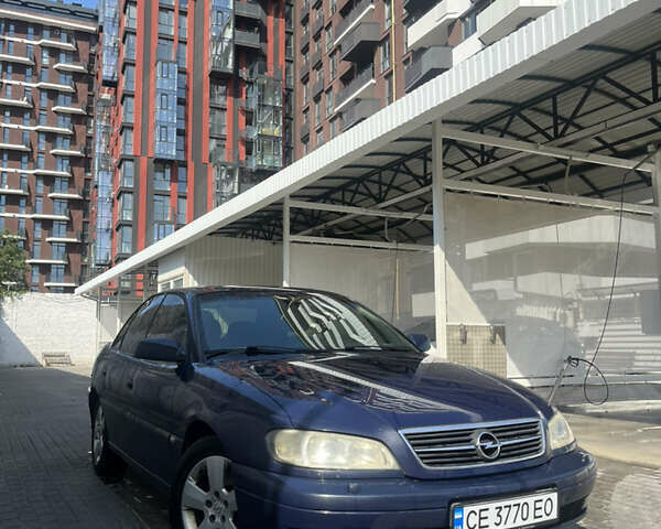 Синий Опель Омега, объемом двигателя 2.6 л и пробегом 349 тыс. км за 3300 $, фото 1 на Automoto.ua