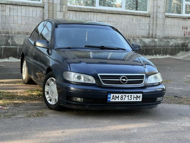 Синий Опель Омега, объемом двигателя 2.2 л и пробегом 65 тыс. км за 2700 $, фото 1 на Automoto.ua