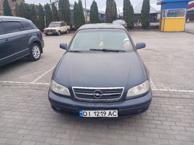 Синий Опель Омега, объемом двигателя 2.2 л и пробегом 680 тыс. км за 1900 $, фото 1 на Automoto.ua