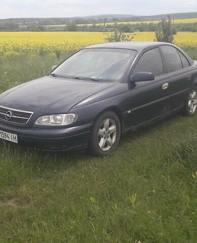 Синій Опель Омега, об'ємом двигуна 2.2 л та пробігом 500 тис. км за 1750 $, фото 1 на Automoto.ua