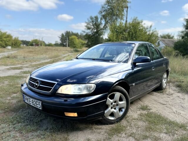 Синий Опель Омега, объемом двигателя 2.5 л и пробегом 260 тыс. км за 1450 $, фото 1 на Automoto.ua