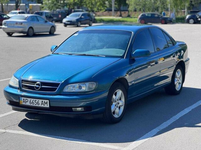 Синий Опель Омега, объемом двигателя 2.2 л и пробегом 113 тыс. км за 3500 $, фото 1 на Automoto.ua