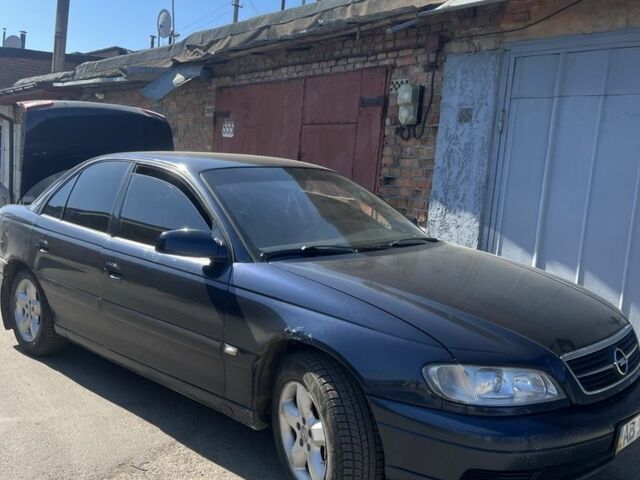 Синий Опель Омега, объемом двигателя 2.2 л и пробегом 400 тыс. км за 1700 $, фото 1 на Automoto.ua