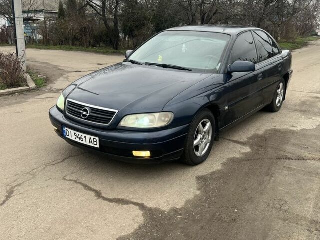 Синий Опель Омега, объемом двигателя 2.2 л и пробегом 343 тыс. км за 2000 $, фото 1 на Automoto.ua