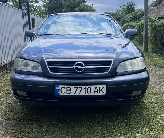 Синий Опель Омега, объемом двигателя 2.2 л и пробегом 260 тыс. км за 2800 $, фото 1 на Automoto.ua
