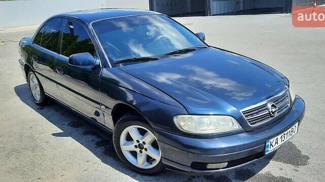 Синий Опель Омега, объемом двигателя 2.2 л и пробегом 333 тыс. км за 3499 $, фото 1 на Automoto.ua