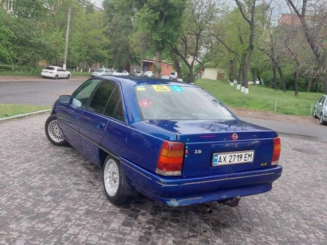 Синий Опель Омега, объемом двигателя 2 л и пробегом 300 тыс. км за 336 $, фото 1 на Automoto.ua