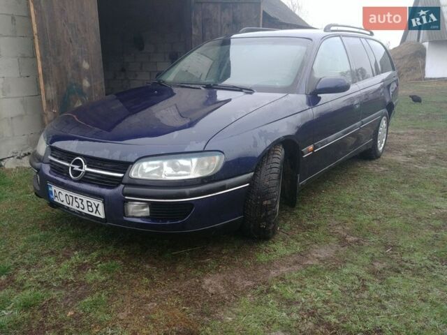 Синий Опель Омега, объемом двигателя 2 л и пробегом 300 тыс. км за 1250 $, фото 1 на Automoto.ua