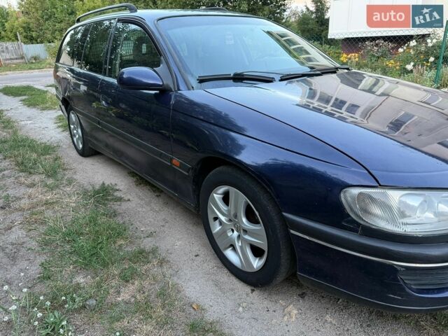 Синий Опель Омега, объемом двигателя 2 л и пробегом 307 тыс. км за 1500 $, фото 1 на Automoto.ua