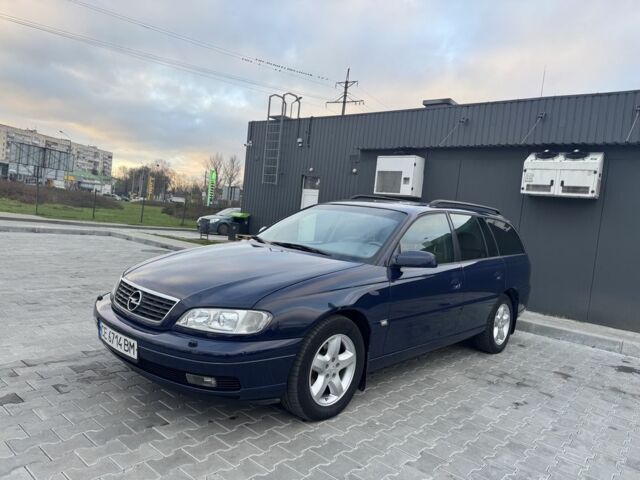 Синий Опель Омега, объемом двигателя 2 л и пробегом 250 тыс. км за 3650 $, фото 1 на Automoto.ua