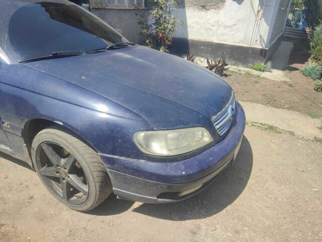 Синій Опель Омега, об'ємом двигуна 2 л та пробігом 356 тис. км за 1800 $, фото 1 на Automoto.ua