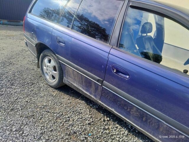 Синій Опель Омега, об'ємом двигуна 2.5 л та пробігом 200 тис. км за 1999 $, фото 1 на Automoto.ua