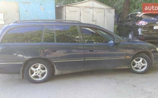 Синий Опель Омега, объемом двигателя 2 л и пробегом 488 тыс. км за 3300 $, фото 1 на Automoto.ua