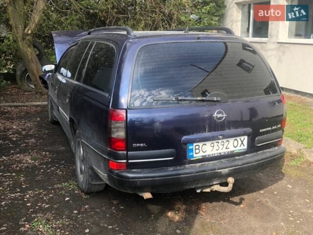 Синий Опель Омега, объемом двигателя 2.5 л и пробегом 222 тыс. км за 600 $, фото 1 на Automoto.ua