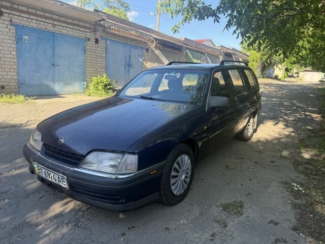 Синий Опель Омега, объемом двигателя 2.3 л и пробегом 260 тыс. км за 1200 $, фото 1 на Automoto.ua
