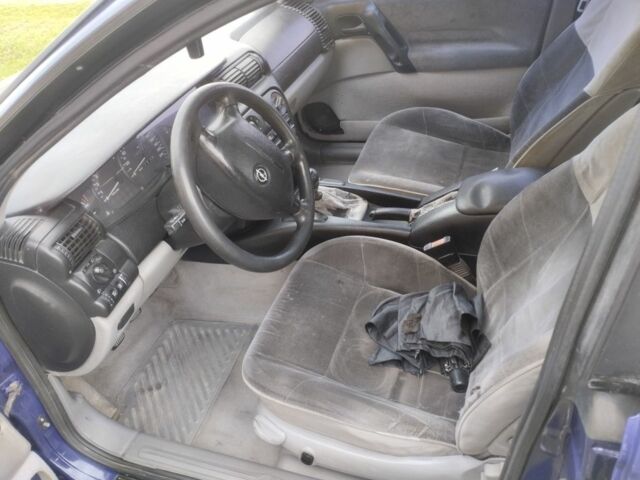 Синій Опель Омега, об'ємом двигуна 2 л та пробігом 306 тис. км за 1950 $, фото 1 на Automoto.ua