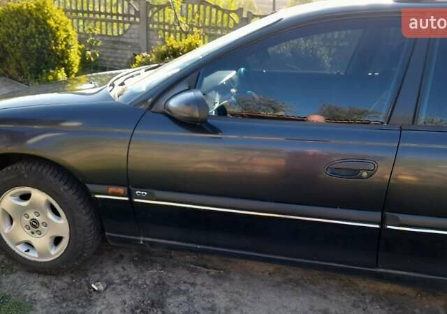 Синий Опель Омега, объемом двигателя 2 л и пробегом 298 тыс. км за 2999 $, фото 1 на Automoto.ua