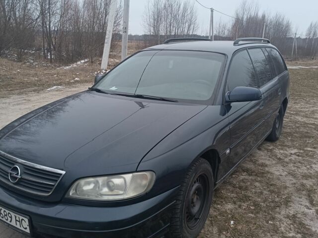Синій Опель Омега, об'ємом двигуна 2 л та пробігом 350 тис. км за 1400 $, фото 1 на Automoto.ua