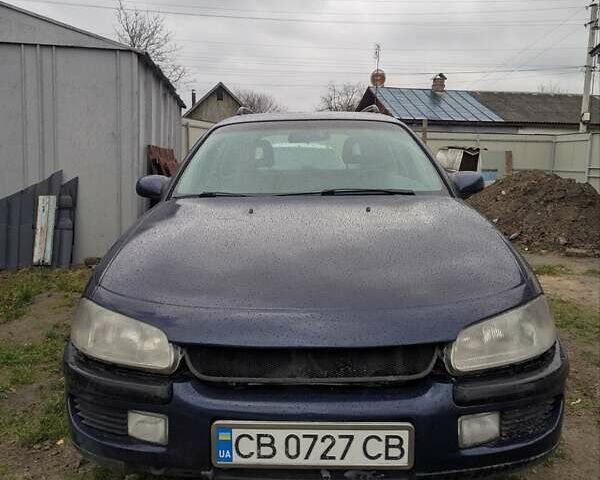 Синий Опель Омега, объемом двигателя 2.5 л и пробегом 400 тыс. км за 2400 $, фото 1 на Automoto.ua