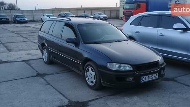Синій Опель Омега, об'ємом двигуна 2.5 л та пробігом 313 тис. км за 2300 $, фото 1 на Automoto.ua