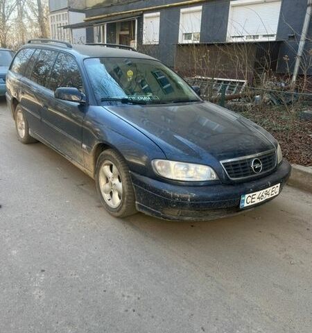 Синий Опель Омега, объемом двигателя 2.2 л и пробегом 265 тыс. км за 1999 $, фото 1 на Automoto.ua