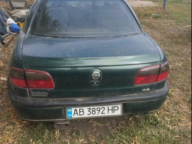 Зеленый Опель Омега, объемом двигателя 3 л и пробегом 300 тыс. км за 695 $, фото 1 на Automoto.ua