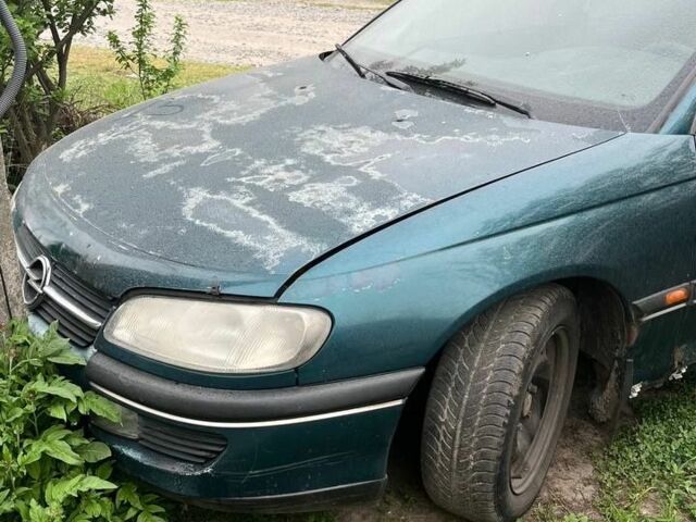 Зеленый Опель Омега, объемом двигателя 2 л и пробегом 100 тыс. км за 685 $, фото 1 на Automoto.ua