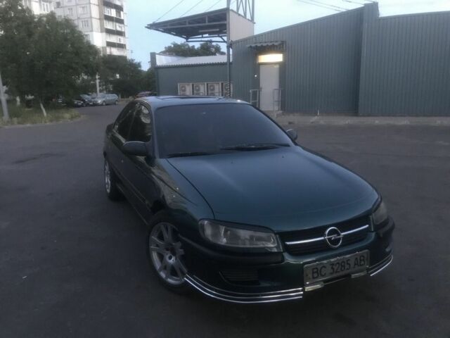 Зеленый Опель Омега, объемом двигателя 2 л и пробегом 320 тыс. км за 1550 $, фото 1 на Automoto.ua