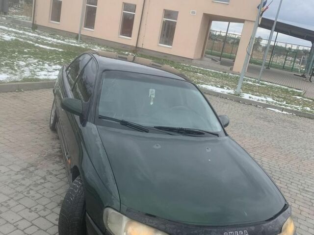 Зеленый Опель Омега, объемом двигателя 2.5 л и пробегом 450 тыс. км за 1500 $, фото 1 на Automoto.ua