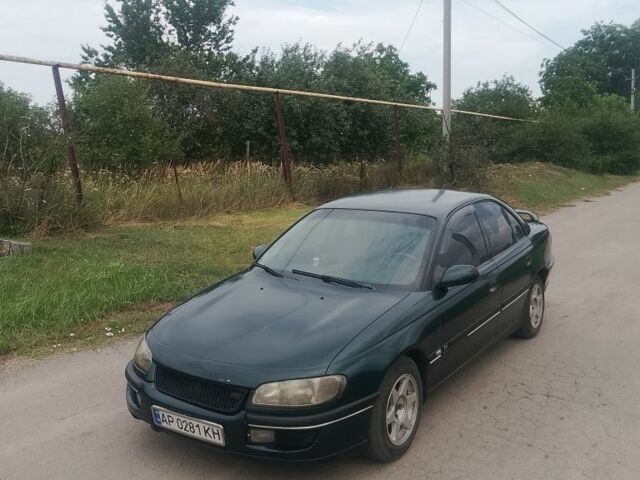 Зеленый Опель Омега, объемом двигателя 2 л и пробегом 185 тыс. км за 2500 $, фото 1 на Automoto.ua