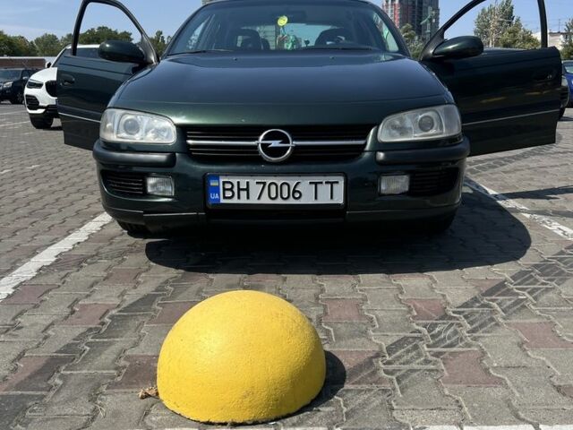 Зеленый Опель Омега, объемом двигателя 2 л и пробегом 350 тыс. км за 4000 $, фото 1 на Automoto.ua