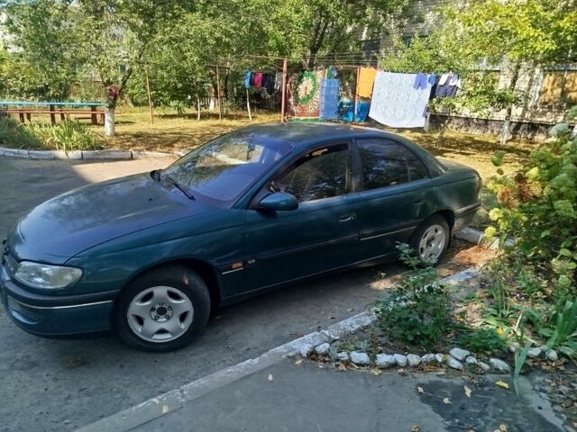 Зеленый Опель Омега, объемом двигателя 1.9 л и пробегом 250 тыс. км за 1800 $, фото 1 на Automoto.ua