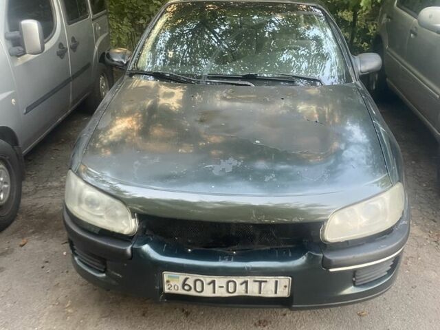 Зелений Опель Омега, об'ємом двигуна 2 л та пробігом 300 тис. км за 702 $, фото 1 на Automoto.ua