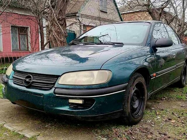 Зелений Опель Омега, об'ємом двигуна 2 л та пробігом 300 тис. км за 2500 $, фото 1 на Automoto.ua
