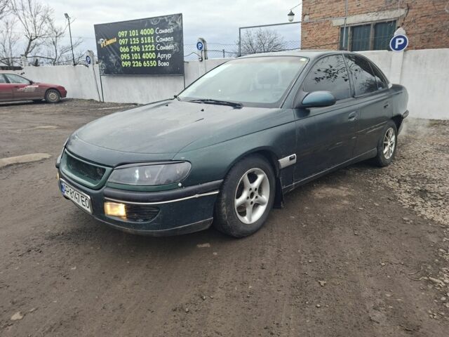 Зеленый Опель Омега, объемом двигателя 2 л и пробегом 189 тыс. км за 700 $, фото 1 на Automoto.ua