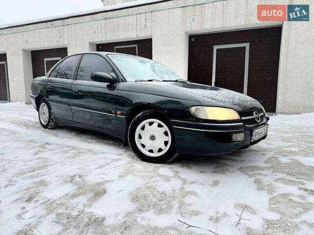 Зеленый Опель Омега, объемом двигателя 2 л и пробегом 300 тыс. км за 1500 $, фото 1 на Automoto.ua