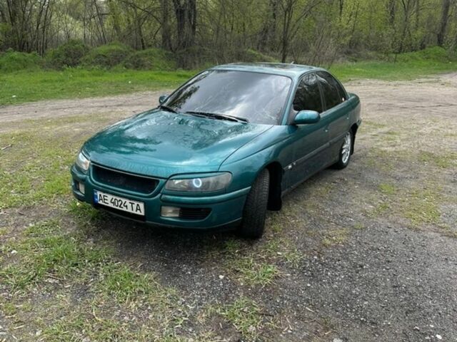 Зеленый Опель Омега, объемом двигателя 2.5 л и пробегом 460 тыс. км за 2400 $, фото 1 на Automoto.ua
