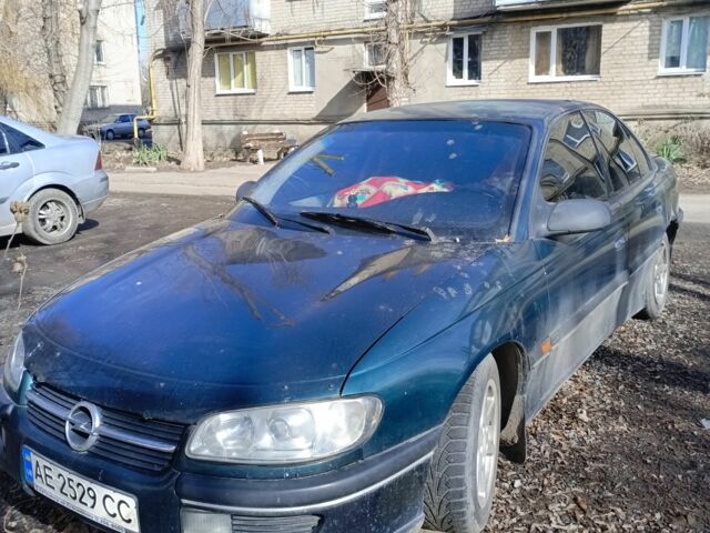Зеленый Опель Омега, объемом двигателя 2 л и пробегом 345 тыс. км за 900 $, фото 1 на Automoto.ua
