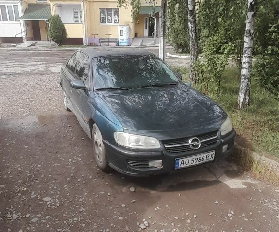 Зеленый Опель Омега, объемом двигателя 0 л и пробегом 135 тыс. км за 700 $, фото 1 на Automoto.ua