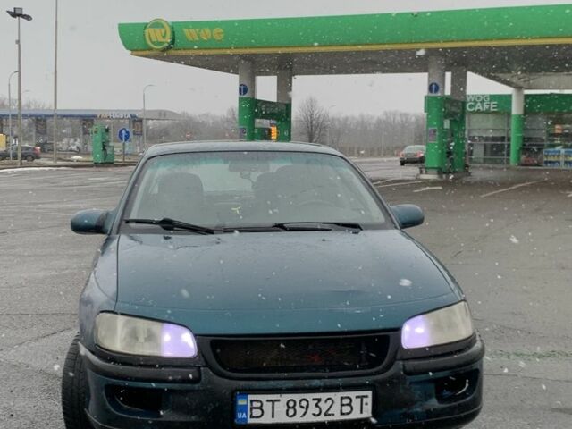 Зеленый Опель Омега, объемом двигателя 2 л и пробегом 287 тыс. км за 1450 $, фото 1 на Automoto.ua