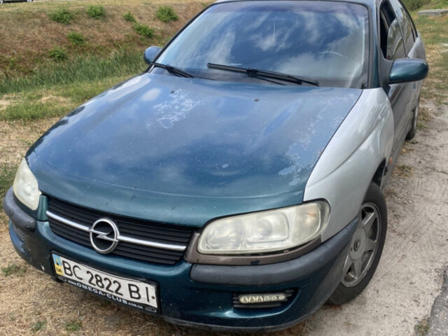 Зеленый Опель Омега, объемом двигателя 2 л и пробегом 400 тыс. км за 1250 $, фото 1 на Automoto.ua