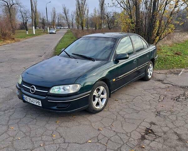 Зеленый Опель Омега, объемом двигателя 2 л и пробегом 280 тыс. км за 1950 $, фото 1 на Automoto.ua
