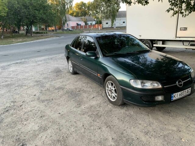 Зеленый Опель Омега, объемом двигателя 2 л и пробегом 300 тыс. км за 1600 $, фото 1 на Automoto.ua