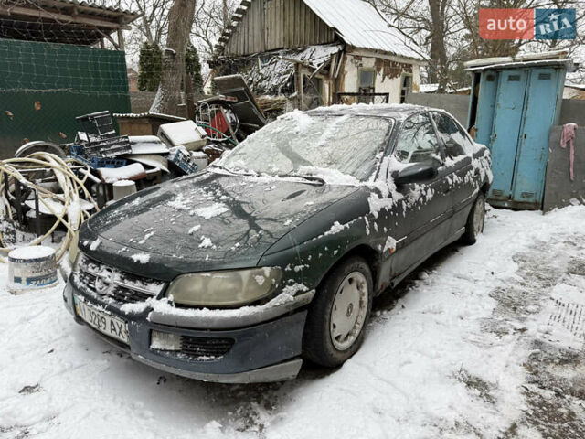 Зеленый Опель Омега, объемом двигателя 2 л и пробегом 450 тыс. км за 850 $, фото 1 на Automoto.ua