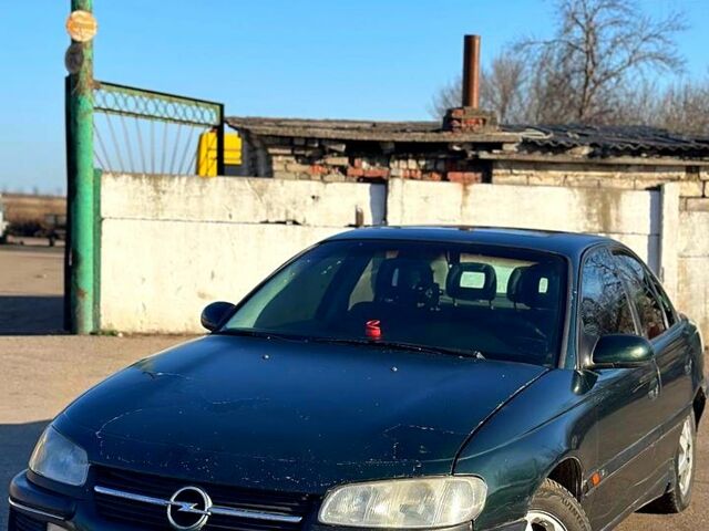 Зеленый Опель Омега, объемом двигателя 2 л и пробегом 0 тыс. км за 1300 $, фото 1 на Automoto.ua
