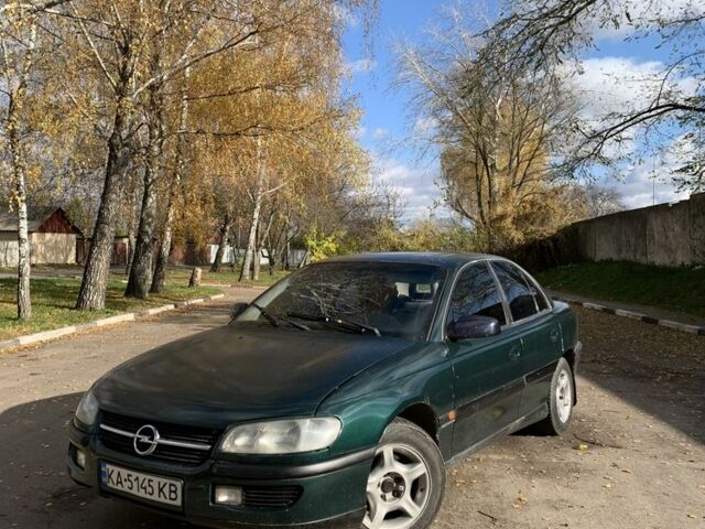 Зелений Опель Омега, об'ємом двигуна 2 л та пробігом 250 тис. км за 1300 $, фото 1 на Automoto.ua